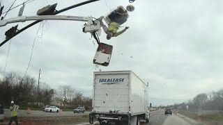 Truck crash sends worker flying out of construction bucket [upl. by Katsuyama]