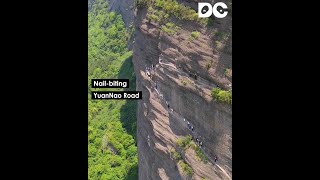 Nailbiting YuanNao Road carved out of sheer cliff face [upl. by Rolfston]