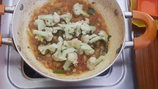 Cauliflower Kuzhambu in Tamil Recipe [upl. by Easlehc309]