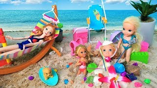 Annia and Elsia Toddlers Play in the Sand Swim at the Beach with Barbie and Chelsea Toys and Dolls [upl. by Nannarb]