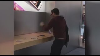 Angry Customer iPhone Smasing Spree in Apple Store [upl. by Ailime]