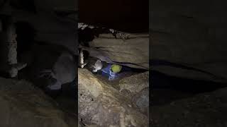 Caver exhales to squeeze through a tight passage caving [upl. by Sibeal]