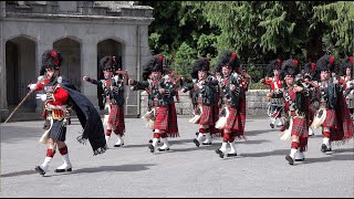 Black Watch Pipes and Drums lead the Royal Guard out of Balmoral Castle with pony mascot Cruachan IV [upl. by Inoy936]