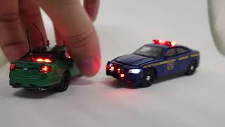 Custom LED Greenlight Dodge Charger Police 164 scale [upl. by Nairret]