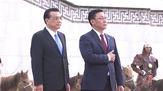 Mongolian PM Holds Ceremony to Welcome Visiting Chinese Premier [upl. by Atnovart]