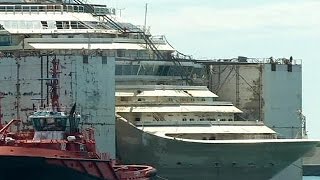 Costa Concordia wreck docks in Genoa [upl. by Asilej]