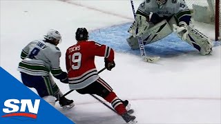 Jonathan Toews Goes InsideOut On Chris Tanev For Slick OT Goal [upl. by Hans]