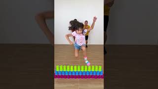 Jumping over Colored cups shorts by GamGam Family [upl. by Nareik560]