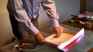 How to stretch a print over a canvas frame [upl. by Nehtan]