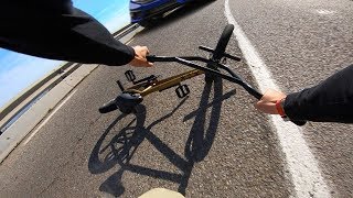 FULL SPEED BMX HILL BOMB CRASH INTO ONCOMING CAR TIBIDABO [upl. by Vocaay139]