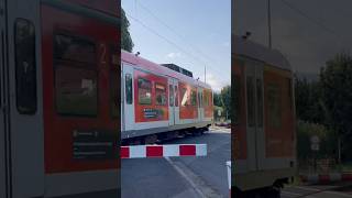 S4 rast über Bahnübergang nach Kronberg trainspotting train railway db sbahn [upl. by Ayikur]