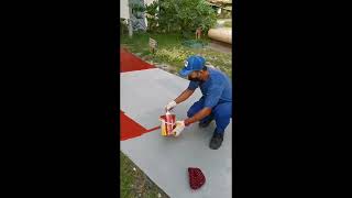 Application of rubberized paint on outdoor pathway of garden [upl. by Idell]