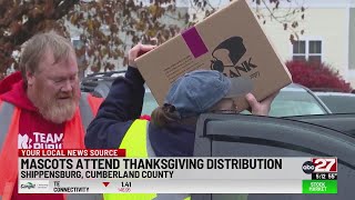 Shippensburg mascots attend Thanksgiving distribution for families in need [upl. by Ennovahs]