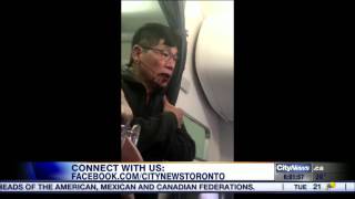 Passenger dragged off United flight [upl. by Meerek]