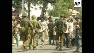 EAST TIMOR AUSTRALIAN TROOPS ARREST MILITIAMEN 3 [upl. by Ellenod956]