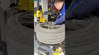 DALI Tire Changer D335 Working on Porsche Panamera 31530 R21 Tire [upl. by Apfelstadt]