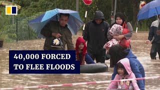 Nearly 40000 people forced to flee floodhit homes in southern Malaysia [upl. by Carita]