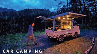 Car camping in heavy rain Recordbreaking downpour Car camping in a light truck tentRakuhoro Camp [upl. by Eiralav]