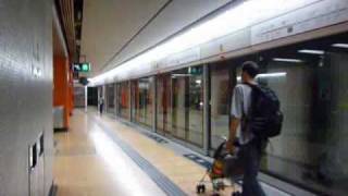 港鐵列車開出旺角站 An MTR train departs from Mong Kok Station [upl. by Anayi669]