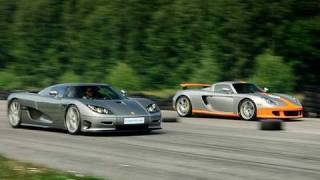 Porsche Carrera GT vs Koenigsegg CCR Evolution x 2 Races to 200 mph  320 kmh [upl. by Hinkel]