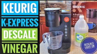 HOW TO DESCALE USING VINEGAR Keurig KExpress Essentials Single Serve K cup Coffee Maker light ON [upl. by Ecirtnahs]