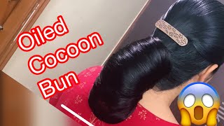 Oiled Cocoon Bun  how to make south India Big cocoon Hair Bun [upl. by Chancelor]