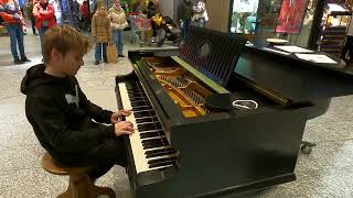 Playing famous songs on piano in public [upl. by Purington728]