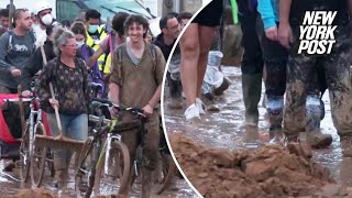 Volunteers arrive to help flood relief efforts in Paiporta Spain [upl. by Bohlin]