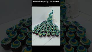 Peacock Theme cake for the first time in India made with cake and cupcakes isnt it amazing 😍 [upl. by Adnolehs364]