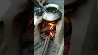 चूल्हे पर बना सरसो का साग  villagekitchen desifood village foodie shorts [upl. by Ahsinek]