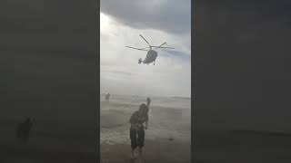 Helicopter disperses swimmers from Gulf of Finland beach in Sosnovy Bor [upl. by Dnalra]