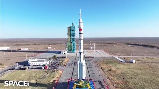 Chinas Shenzhou 19 crews Long March 2F rocket rolled out to the pad [upl. by Clevie]