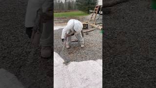 Spraying the foam to separate the ground from the radiant concrete slab [upl. by Adnalro]