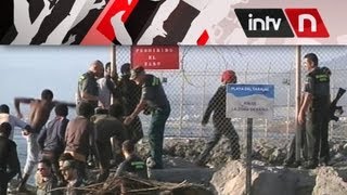 UNOS 400 INMIGRANTES SUBSAHARIANOS ASALTAN MELILLA Y CEUTA [upl. by Ogden]