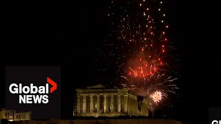 New Years 2024 Athens Acropolis illuminated by colourful fireworks display [upl. by Drannel642]