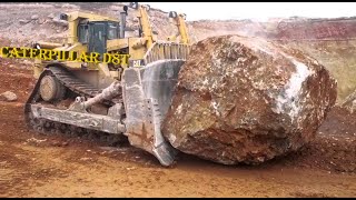 Caterpillar D8T Dozer Pushes 100ton Boulders [upl. by Clothilde]