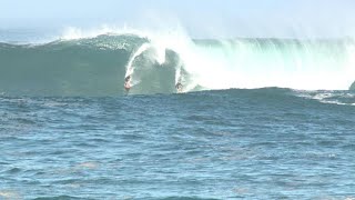 WATCH Surfers charge huge waves at Waimea Bay Peahi [upl. by Yanal]