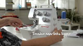 BERNINA overlocker L 220 inrijgen en coversteken naaien [upl. by Ecissej]