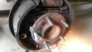 03 grandcaravan rear wheel bearing removal [upl. by Hakilam]