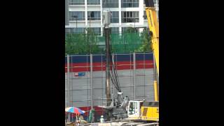 Crush Piler installing Sheet Pile  Birds eye view Fuchi Pte Ltd [upl. by Nynahs]