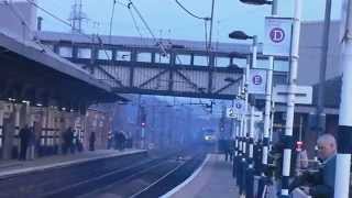 60007 Sir Nigel Gresley tearing through Grantham 29314 The Cathederals Express [upl. by Leffen622]