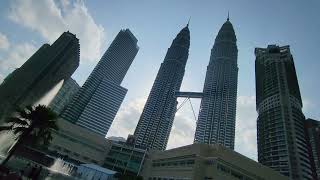 Suria KLCC Park Esplanade Fountains and Petronas Twin Towers Kuala Lumpur explorekualalumpur [upl. by Mochun]