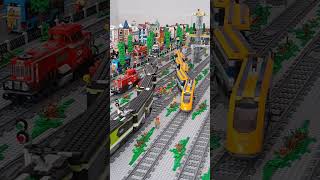 Two Lego passenger trains leave the Rail Yard lego legotrain legorailyard legocity modeltrains [upl. by Noyrb793]