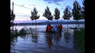 Over 1000 Trapped at Nursing Home in NE China Flood [upl. by Oirottiv]