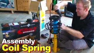 Strut amp Coil Spring Via Somewhat Dangerous Cheap Spring Compressor [upl. by Eniledam]