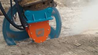 Omnicut rock saw O4HP on a 18T excavator [upl. by Assenal20]