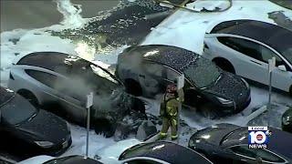 Tesla erupts in flames at Fort Lauderdale dealership [upl. by Lyrehc]