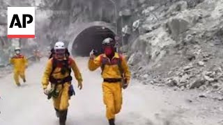 Rescue teams search for family feared trapped in rockslide after Taiwan earthquake [upl. by Aggri602]