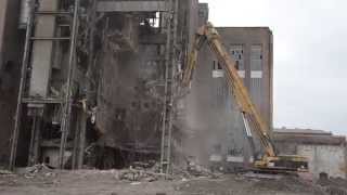 Cat 5110B HRD 88 high reach demolition excavator with 88 meter demolition boom [upl. by Adnamal]