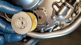 HowtoChange Motorcycle Oil CRF250L [upl. by Saticilef626]